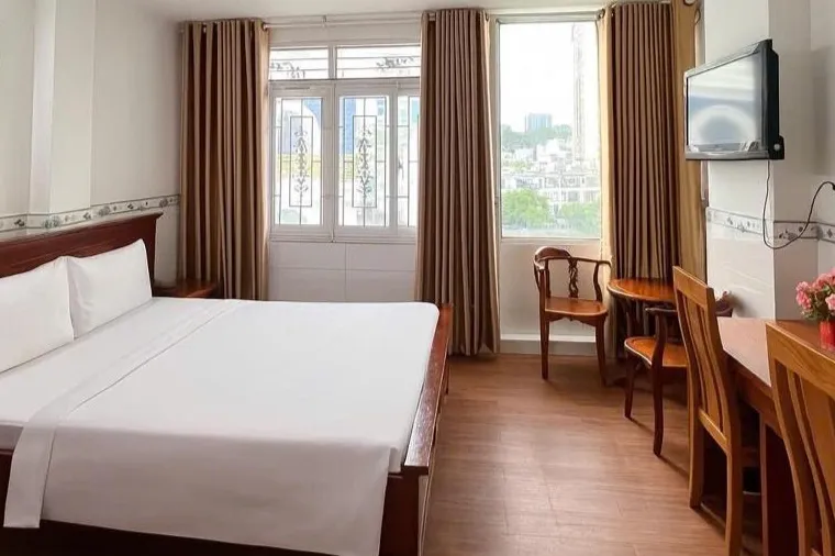Familienzimmer in Vietnam mit ein sehr großes Bett.